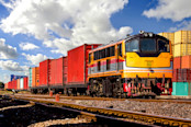 Container Freight Train with cloudy sky