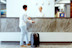 man at hotel reception