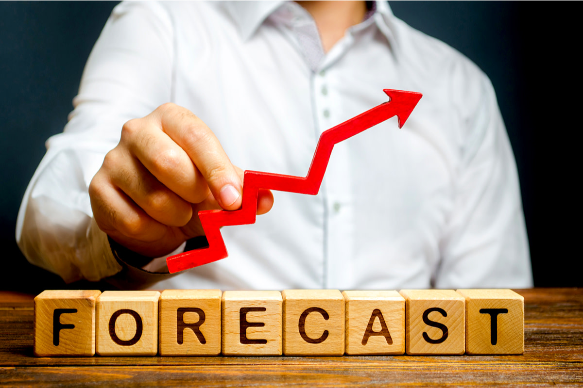 Man holds red arrow up over word Forecast