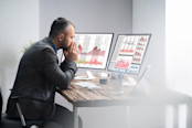 Businessman With Stock Loss And Decrease Chart