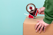 taping up a cardboard box