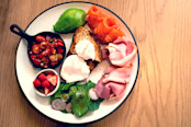 breakfast with toast, poached egg, salmon and bacon