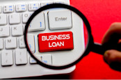 Business Loan word written on keyboard