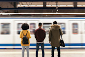 Group of friends waiting the train in the platform