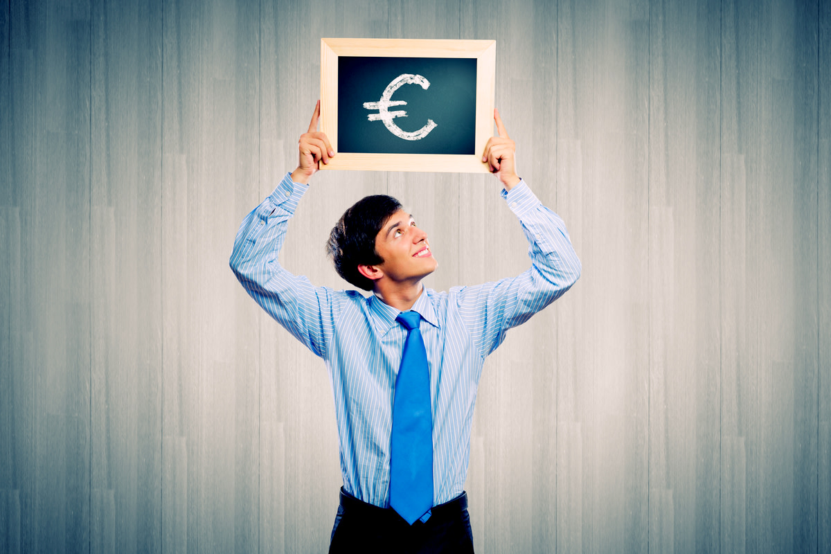man holding frame with euro sign