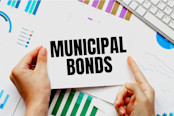 holding a card with text MUNICIPAL BONDS