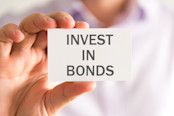 a card with INVEST IN BONDS message