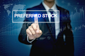 Businessman hand touching PREFERRED STOCK button