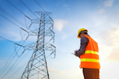 working on High-voltage tower
