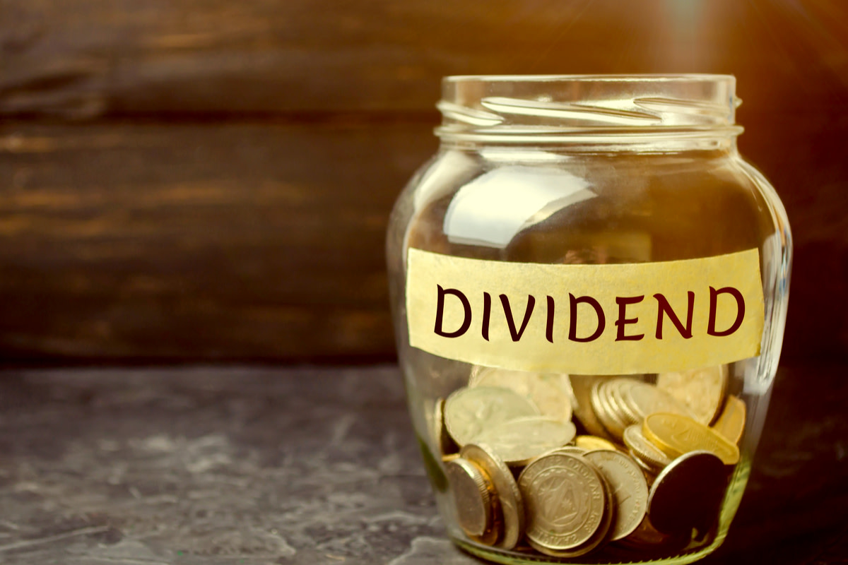 Glass jar with the word Dividend