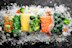 Assortment of frozen vegetables on ice