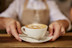 Close up of man serving coffee