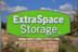 Signs advertising an Extra Space Storage facility