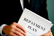 Repayment Plan that the man holds
