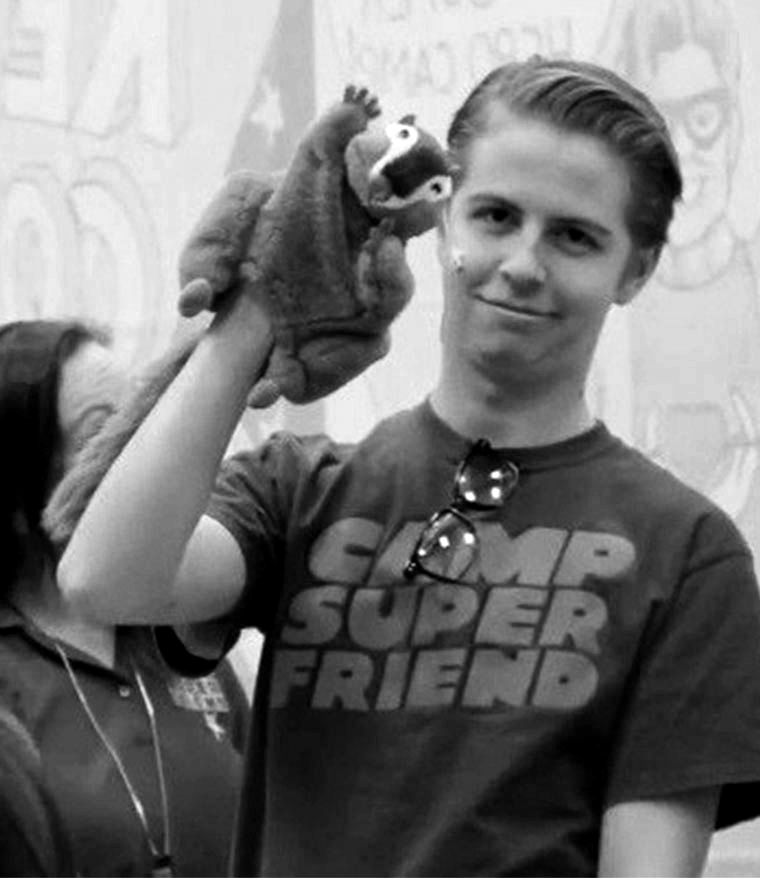 student actor with puppet