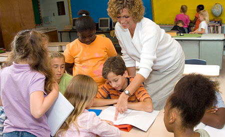 Teacher-Instructing-Classroom-Tabletop