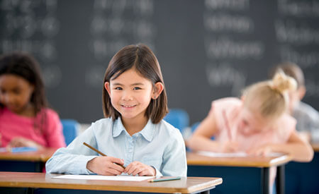 SS-Girl-Smiling-Desk-Pencil-Chalkboard