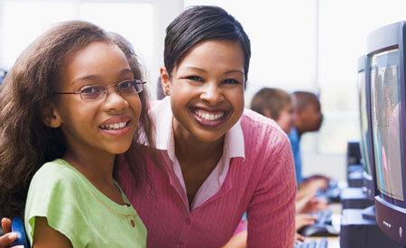 smiling teacher and student