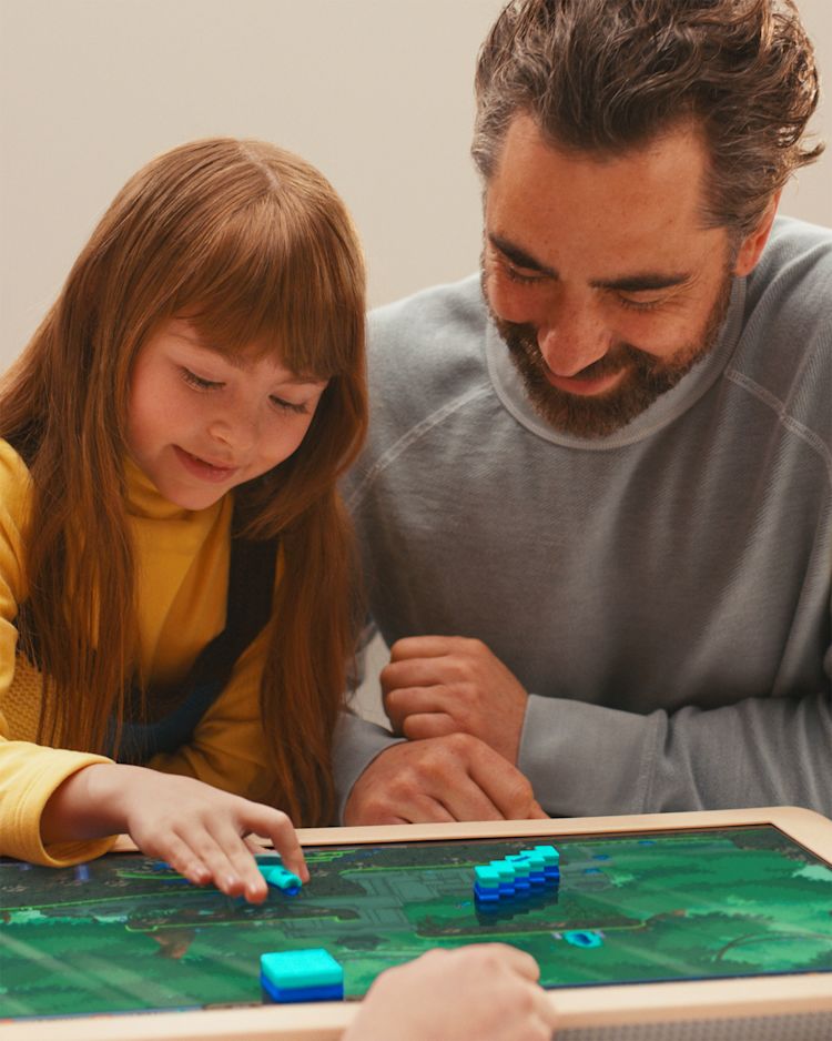 board-mythology-digital-game-hero-brand-launch-film-2025-reimagines-classic-play-instagram-image-father-and-daughter-playing