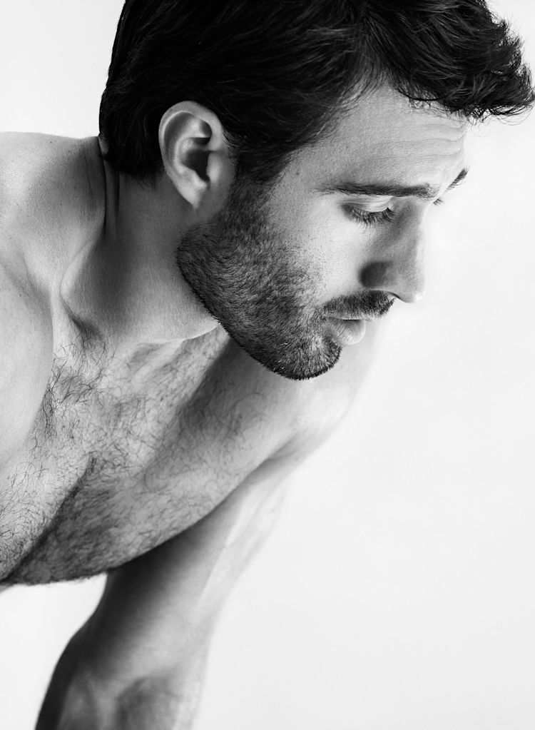 Mirror-Interactive-Gym-Black-And-White-Man-Resting-Stretching-Lifestyle-Photo