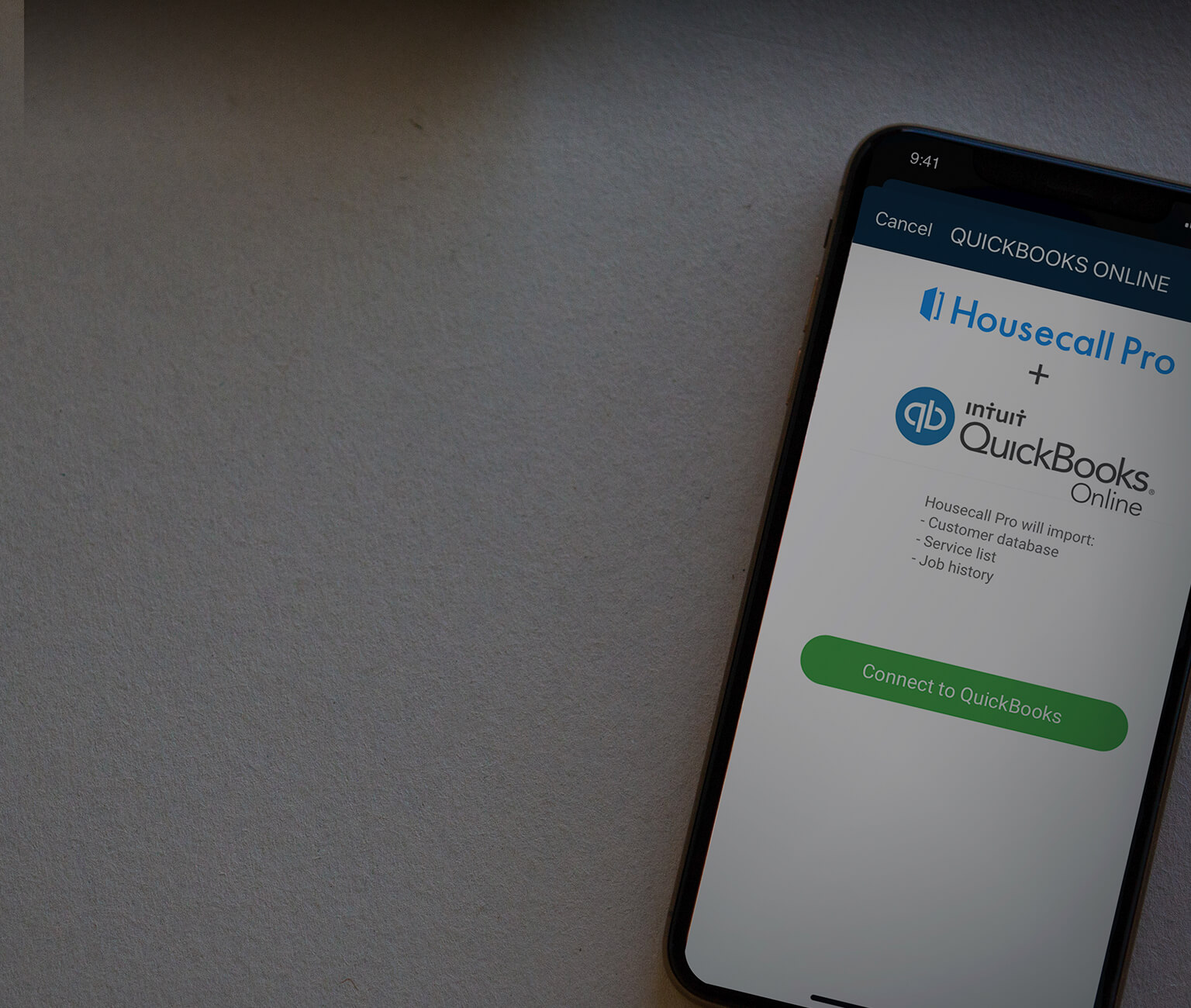 Housecall Pro's software for quickbooks on an iPhone 11