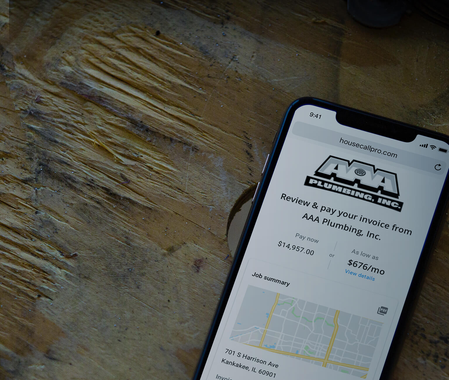 Housecall Pro's invoicing software on an iPhone 11