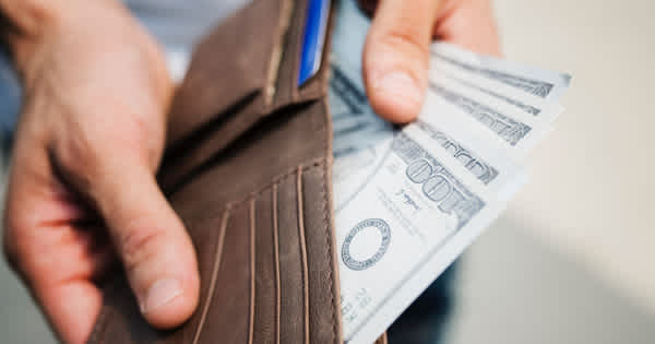 Customer With Wallet Out Paying A Home Service Professional