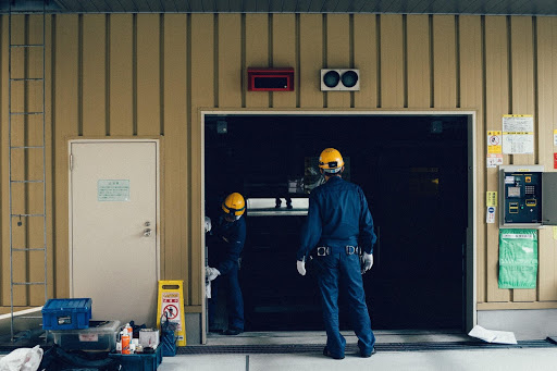 HVAC Technicians Standing In Doorway