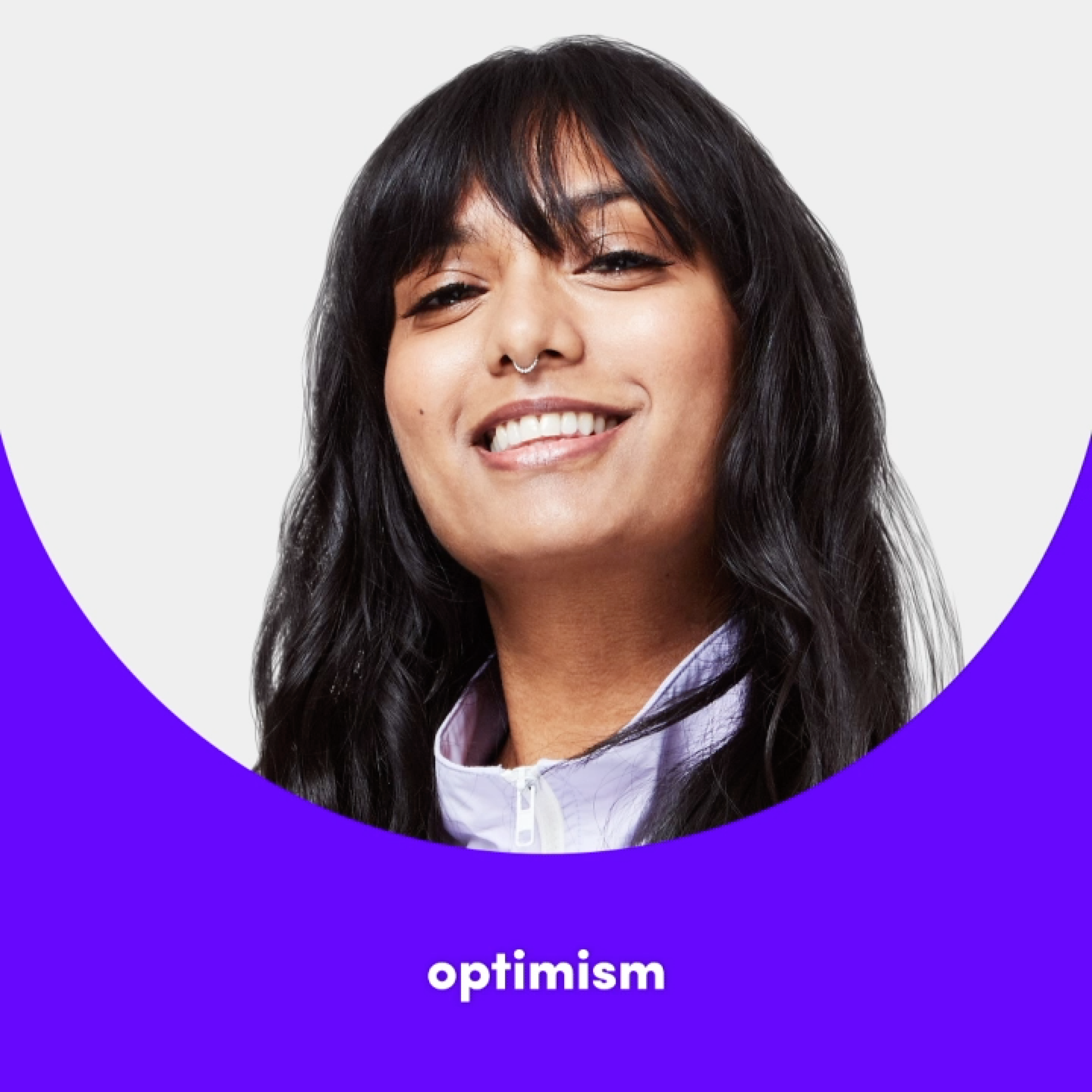 woman-smiling-with-purple-semi-circle-frame-in-front-optimism