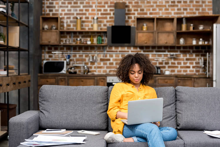 woman with a laptop is working from home