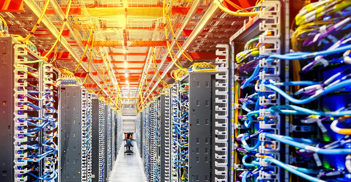 Rows of server racks and network equipment inside a data centre
