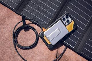 UAG SRGE Slim 5K Power Bank With Stand Portable Charger case in Titanium lifestyle view