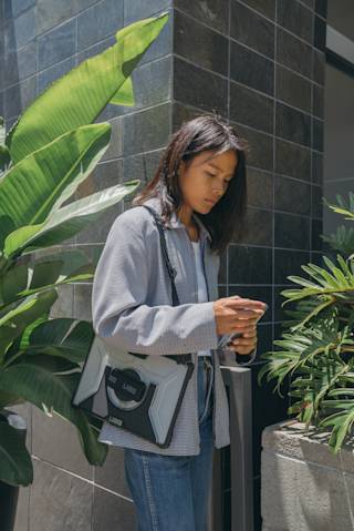 UAG Plasma Series Surface Pro 7+/7/6/5/4 Case w/ Hand & Shoulder Strap Surface Pro 7+/7/6/5/4 in Ice / Plasma lifestyle view