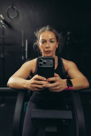 UAG Civilian iPhone 17 Pro Max Case iPhone 17 Pro Max in Olive/Orange lifestyle view