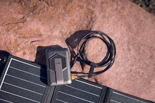 UAG SRGE Rugged 10K Wireless Power Bank With Stand Portable Charger case in Black/Grey lifestyle view