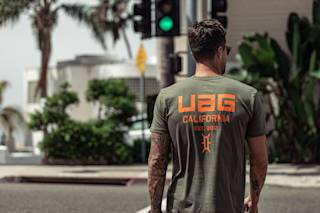 UAG Corpo Cool Tee Apparel case in Black lifestyle view