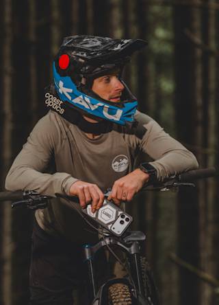 UAG Monarch Pro iPhone 17 Pro Max Case iPhone 17 Pro Max in Crimson lifestyle view