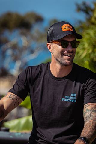 UAG BTGF Trucker Hat Apparel case in Black lifestyle view