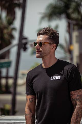 UAG Corpo Cool Tee Apparel case in Black lifestyle view