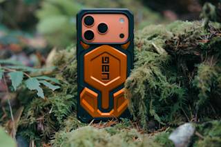 UAG Exclusive Monarch Pro iPhone 17 Pro Max Case iPhone 17 Pro Max in Orange lifestyle view