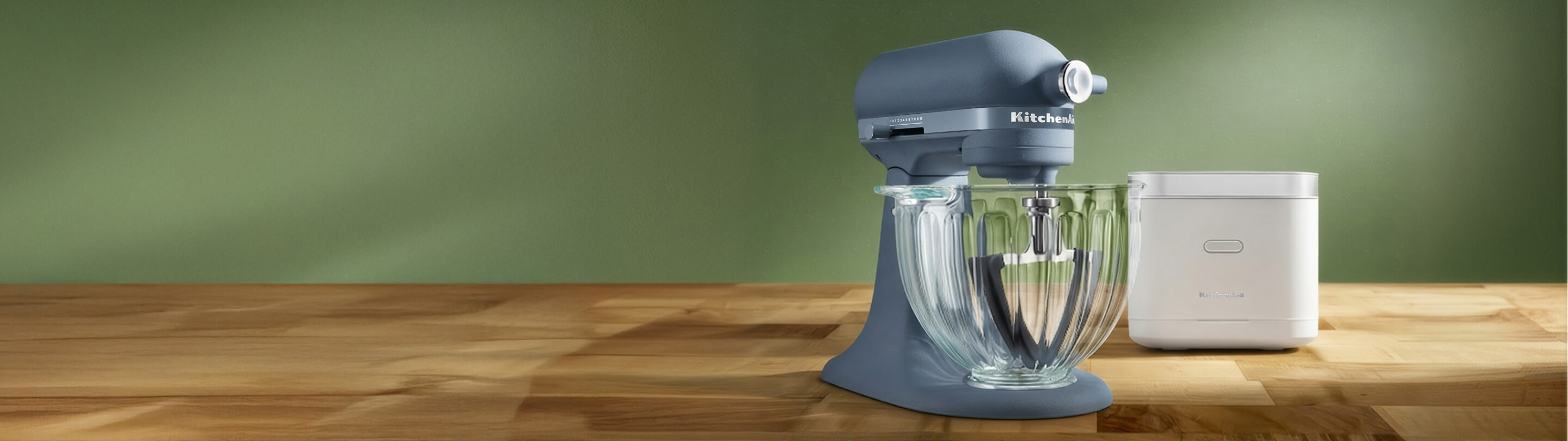 A blue stand mixer and a white grain and rice cooker