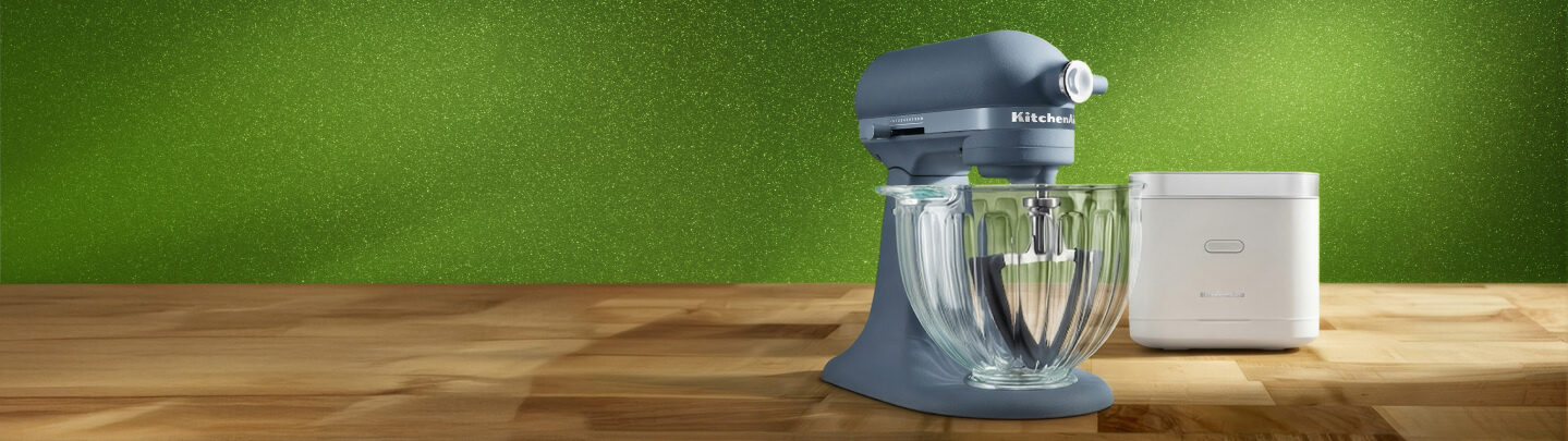A white rice and grain cooker and a Luminaire stand mixer