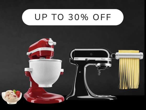 Two KitchenAid® stand mixers with a bowl of ice cream and pasta press attachment