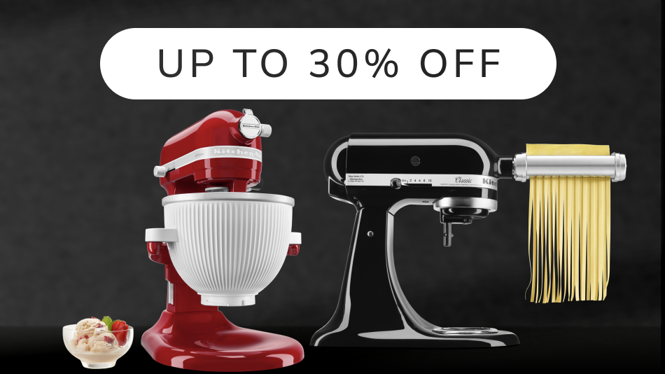 Two KitchenAid® stand mixers with a bowl of ice cream and pasta press attachment