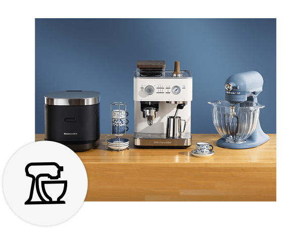 A collection of KitchenAid® products in Porcelain White, Cast Iron Black and Blue Peppercorn