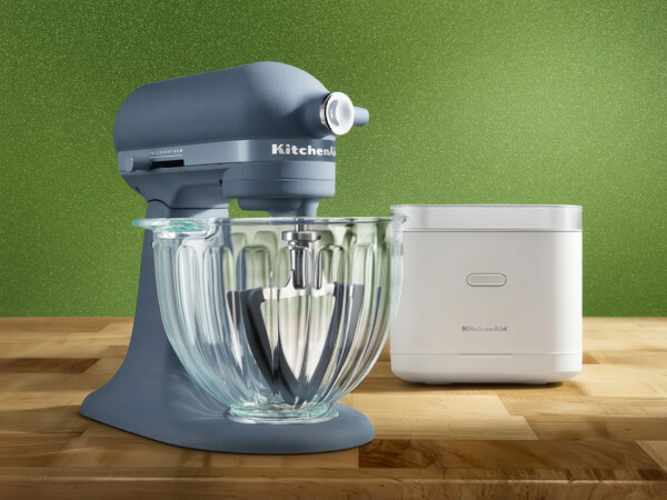 A white rice and grain cooker and a Luminaire stand mixer