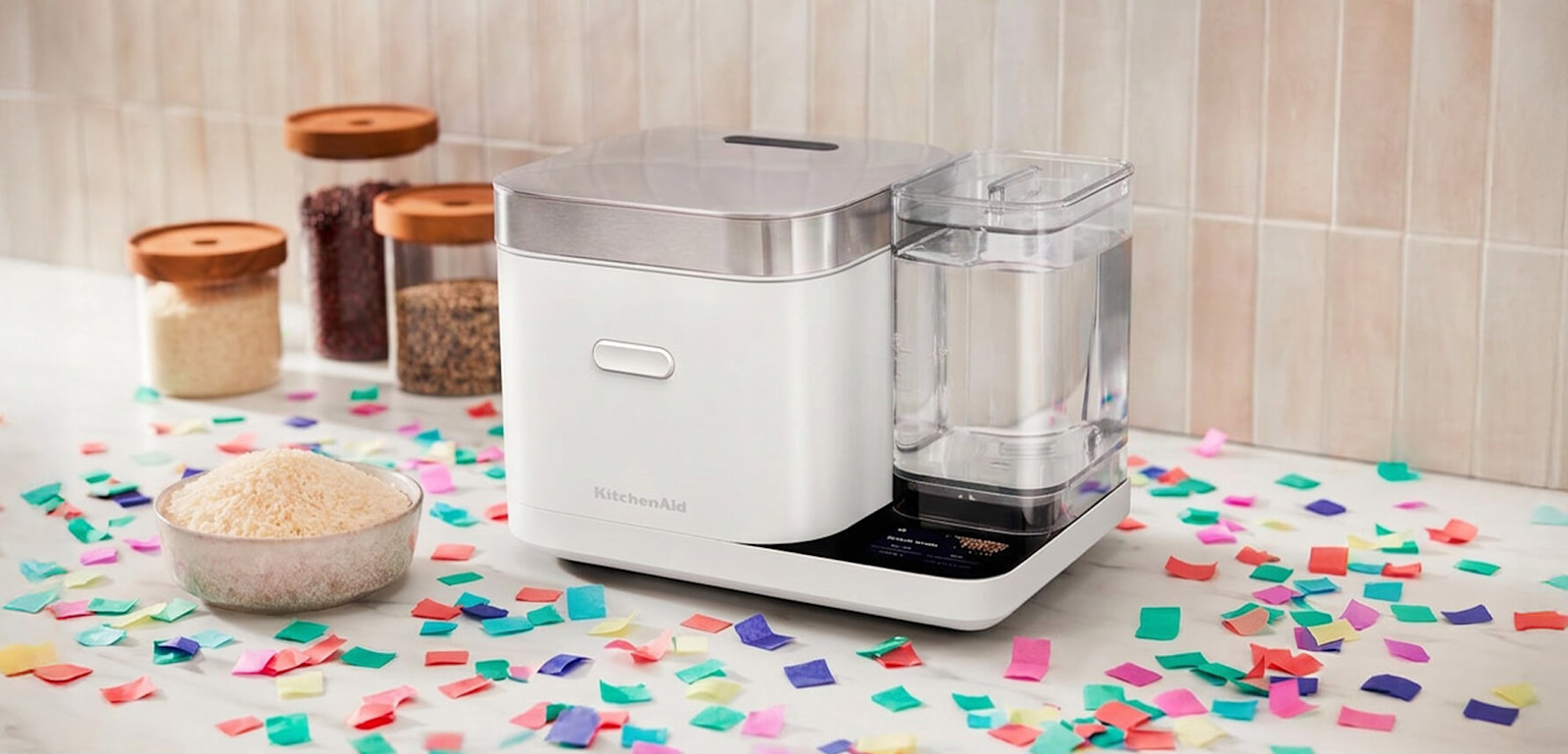 A KitchenAid® Grain and Rice Cooker with scattered confetti