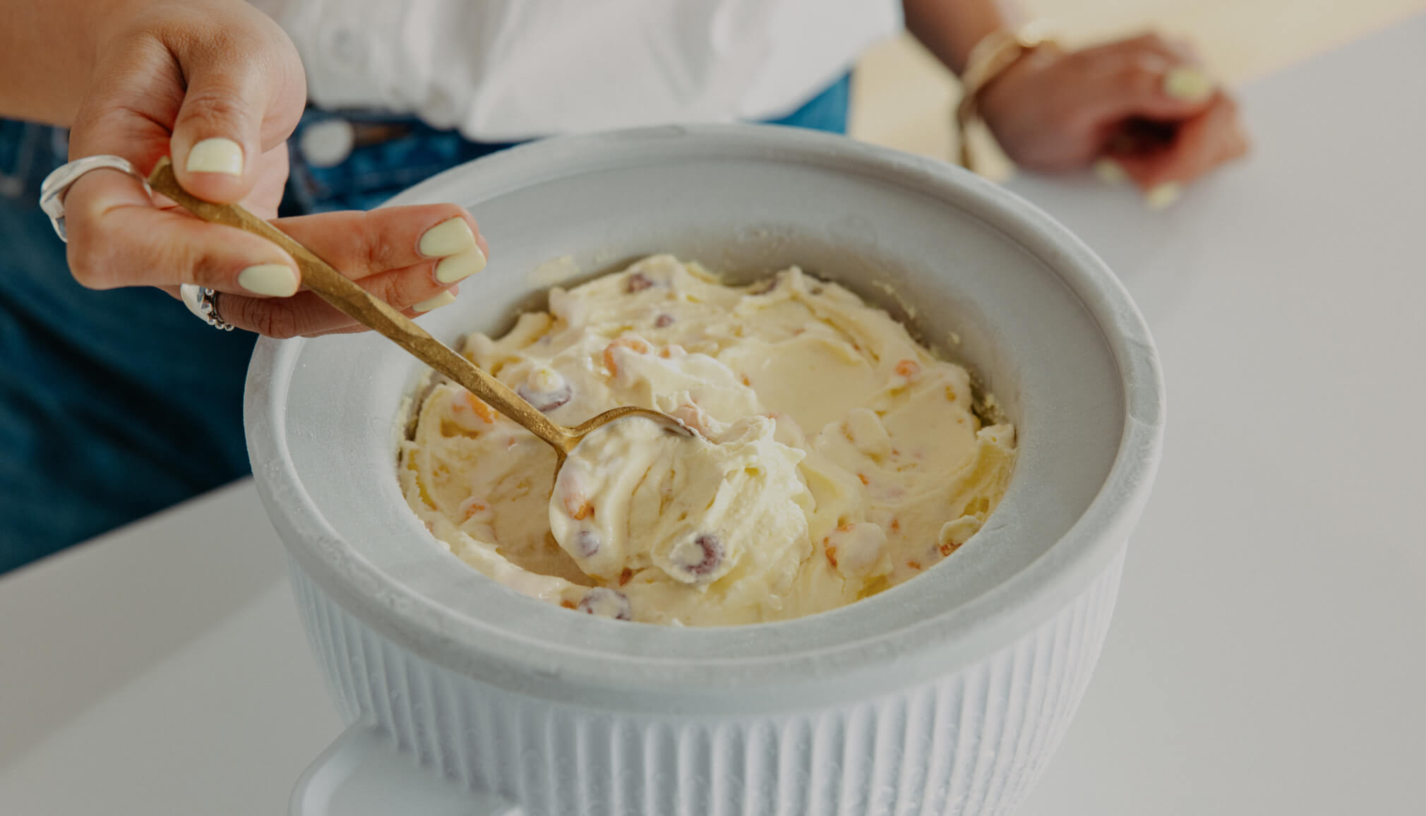 A KitchenAid® Ice Cream Maker bowl filled with homemade ice cream