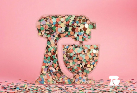 A container in the shape of a KitchenAid® stand mixer full of confetti.
