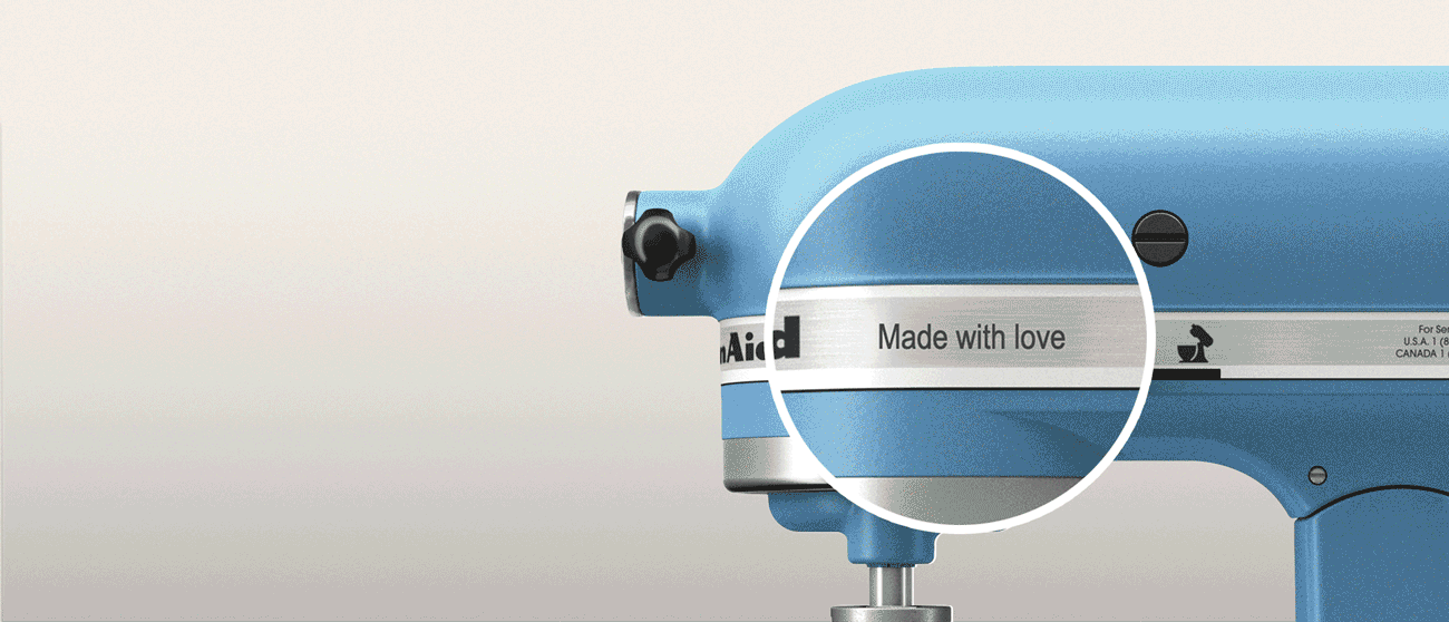 A GIF of an engraved stand mixer with the colors changing